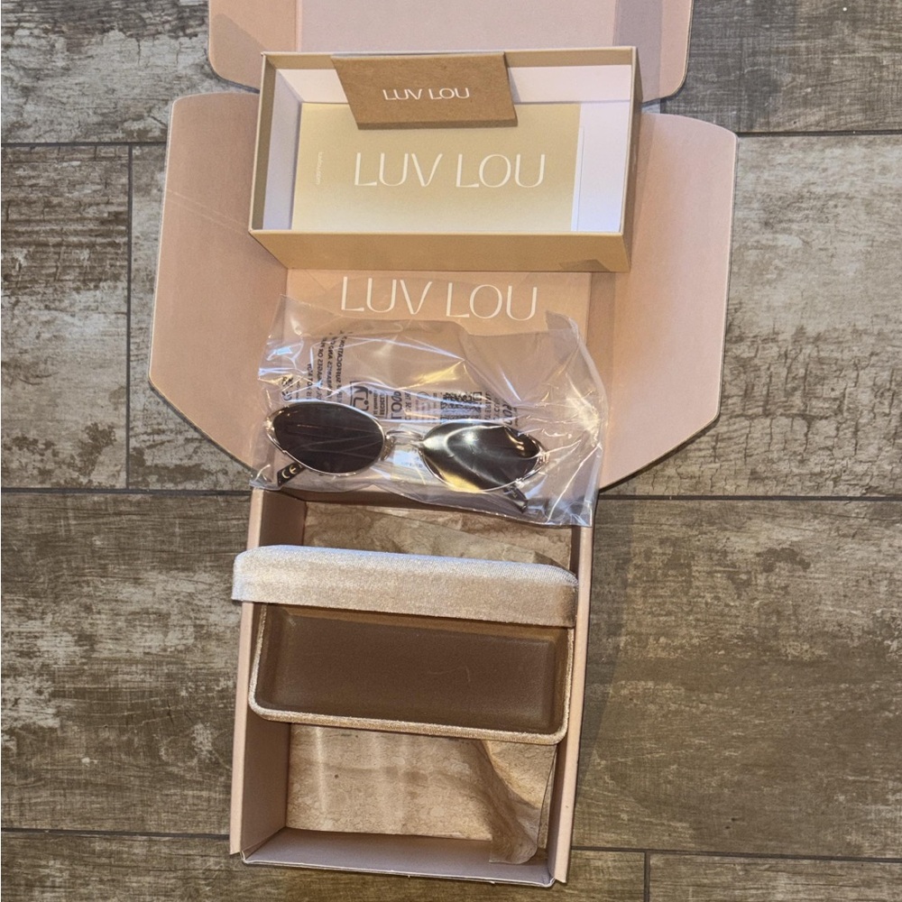 brand new never opened Luv Lou Sunglasses with case!!!